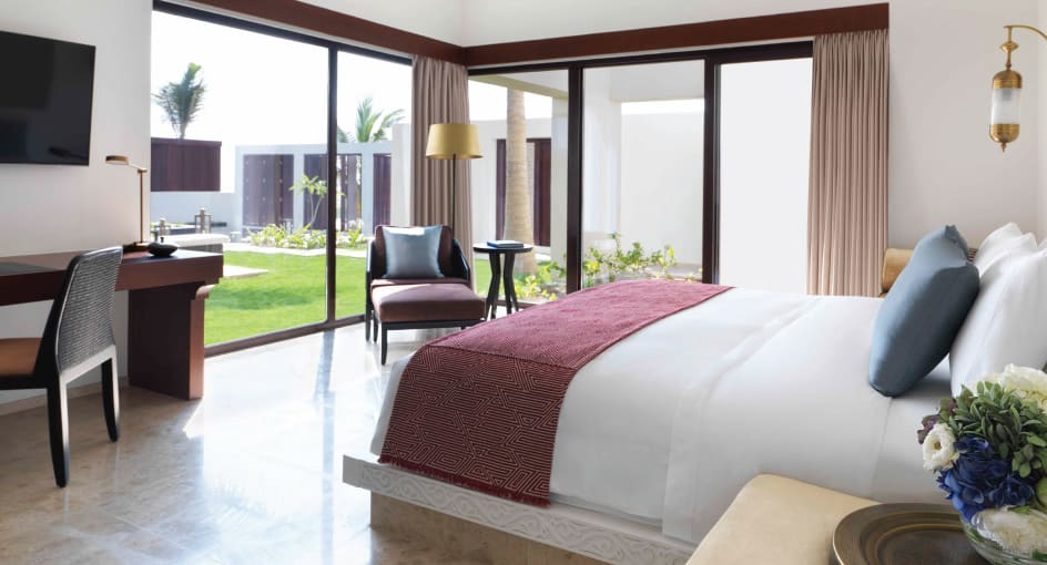 Spacious Bed with Modern Amenities at Three Bedroom Royal Beach Villa of Anantara Oman