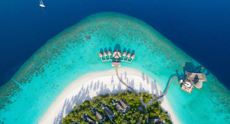Aerial view of Over Water Villas - Anantara Kihavah Maldives