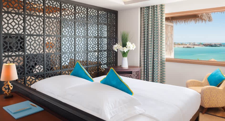 Spacious Bed Overlooking the Ocean at Banana Island Resort Doha