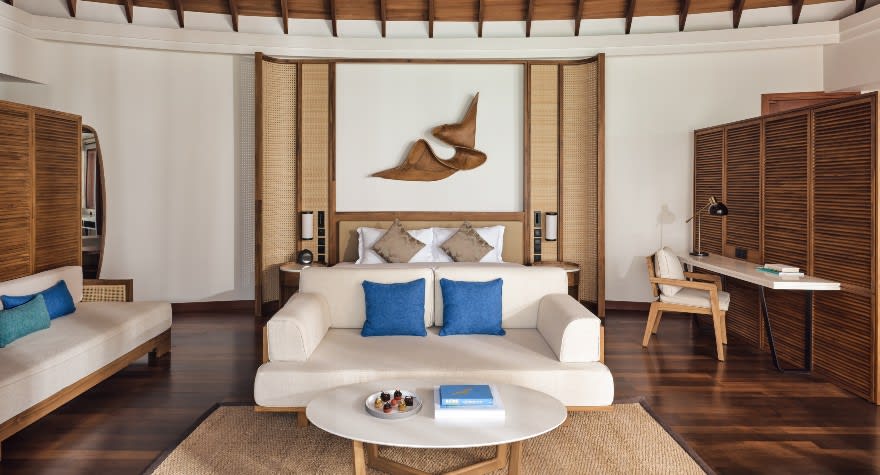 Sunset Over Water Pool Suite Bedroom at Anantara Dhigu Maldives Resort
