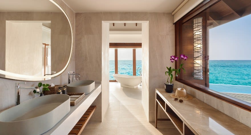 Sunset Over Water Pool Suite Bathroom at Anantara Dhigu Maldives Resort