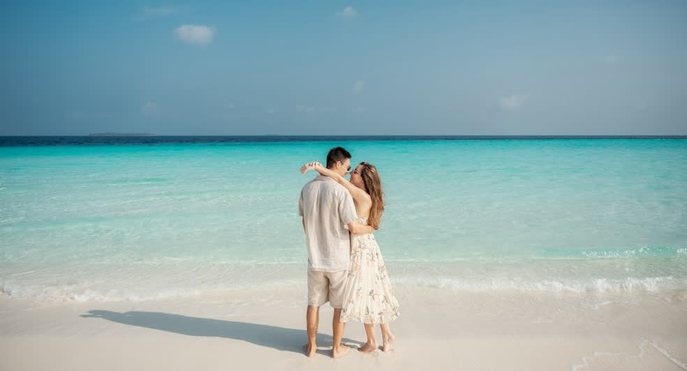 The couple on the beach at Anantara Maldives