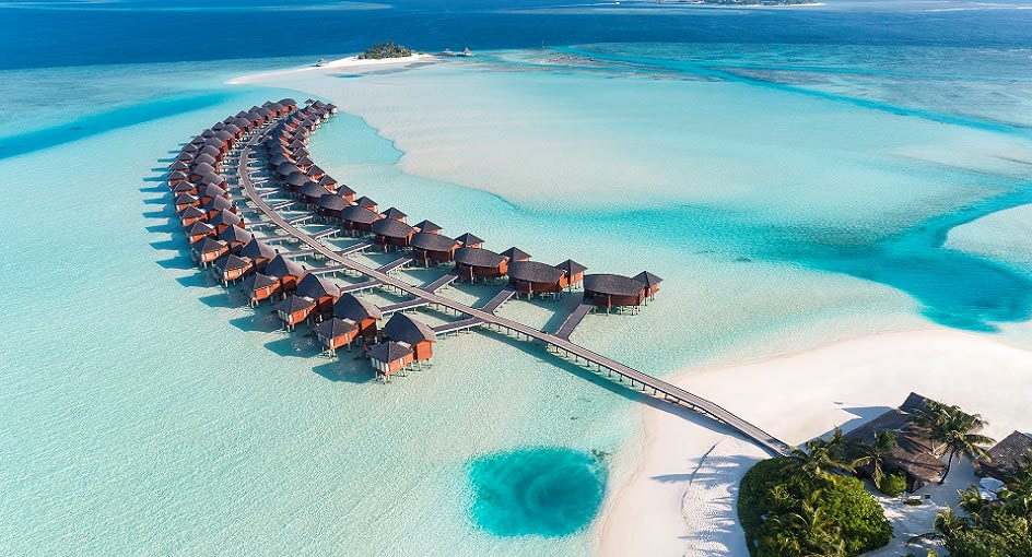 Aerial view of Over Water Suites at Anantara Dhigu Maldives Resort