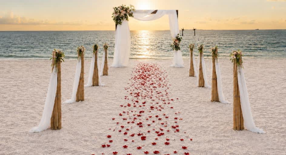Beach wedding setup at Anantara Dhigu Maldives Resort