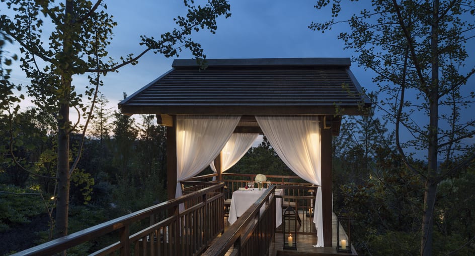Exterior view of private Dining-by_Design set-up at twilight