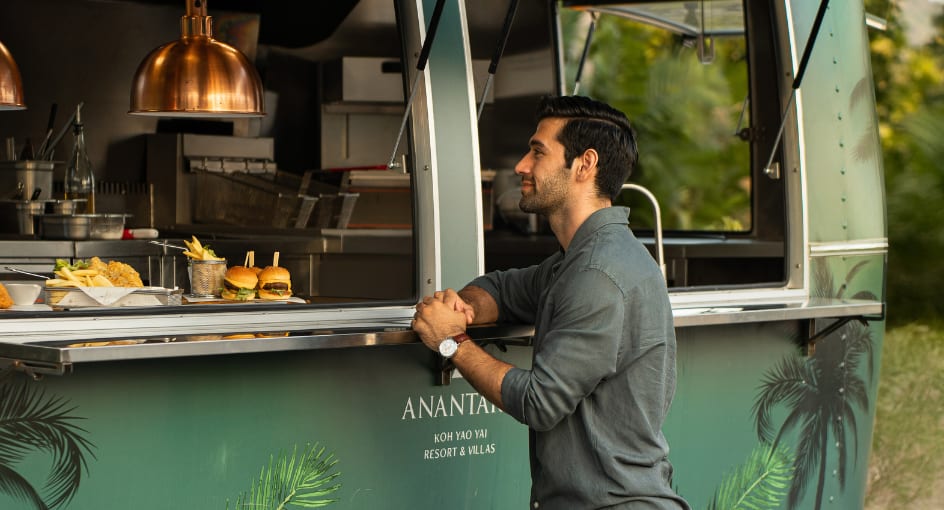 guest orders food at the food truck