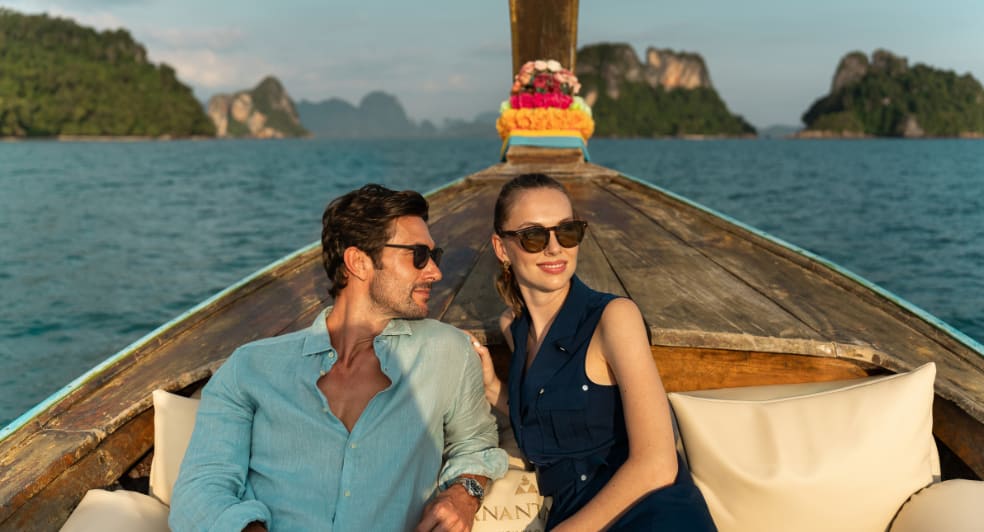 couple on luxury longtail boat