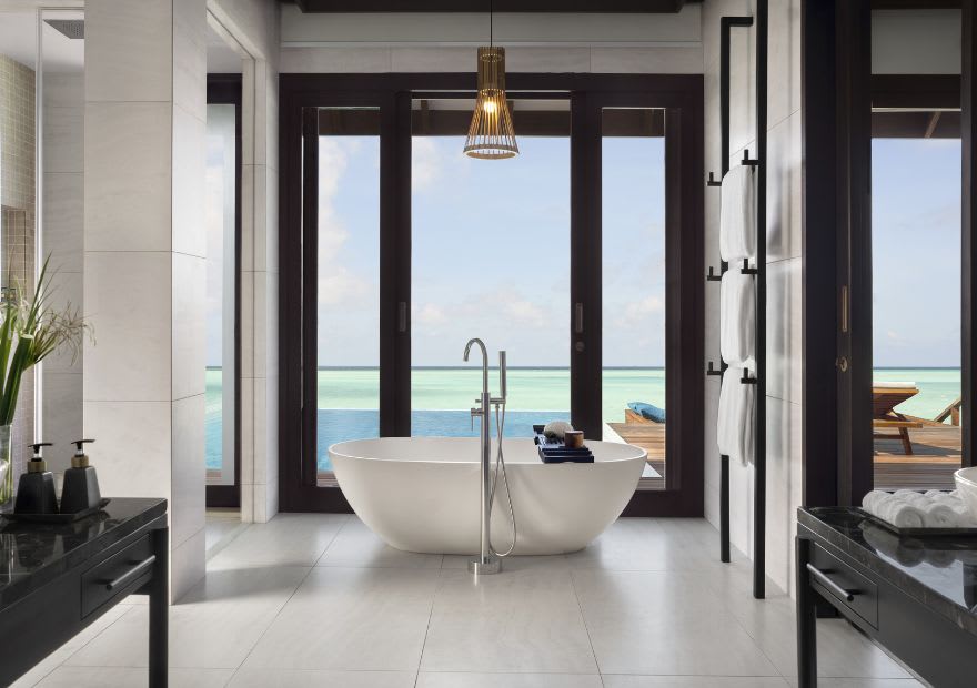 Bathroom with bathtub of the Deluxe Over Water Pool Villa at Anantara Veli Maldives Resort
