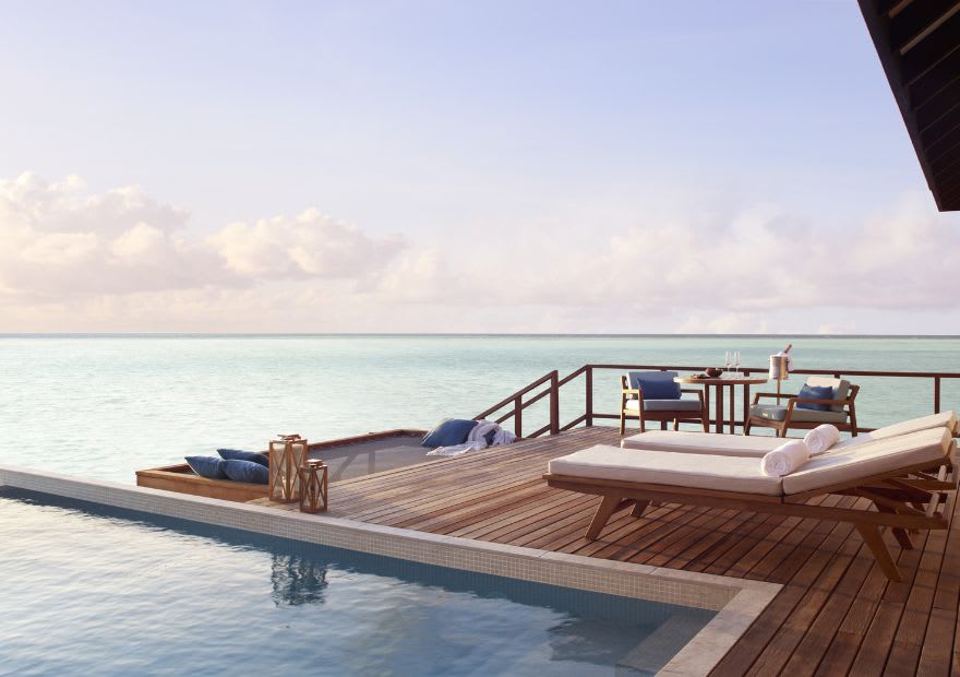Deck with sunloungers of the Deluxe Over Water Pool Villa at Anantara Veli Maldives Resort