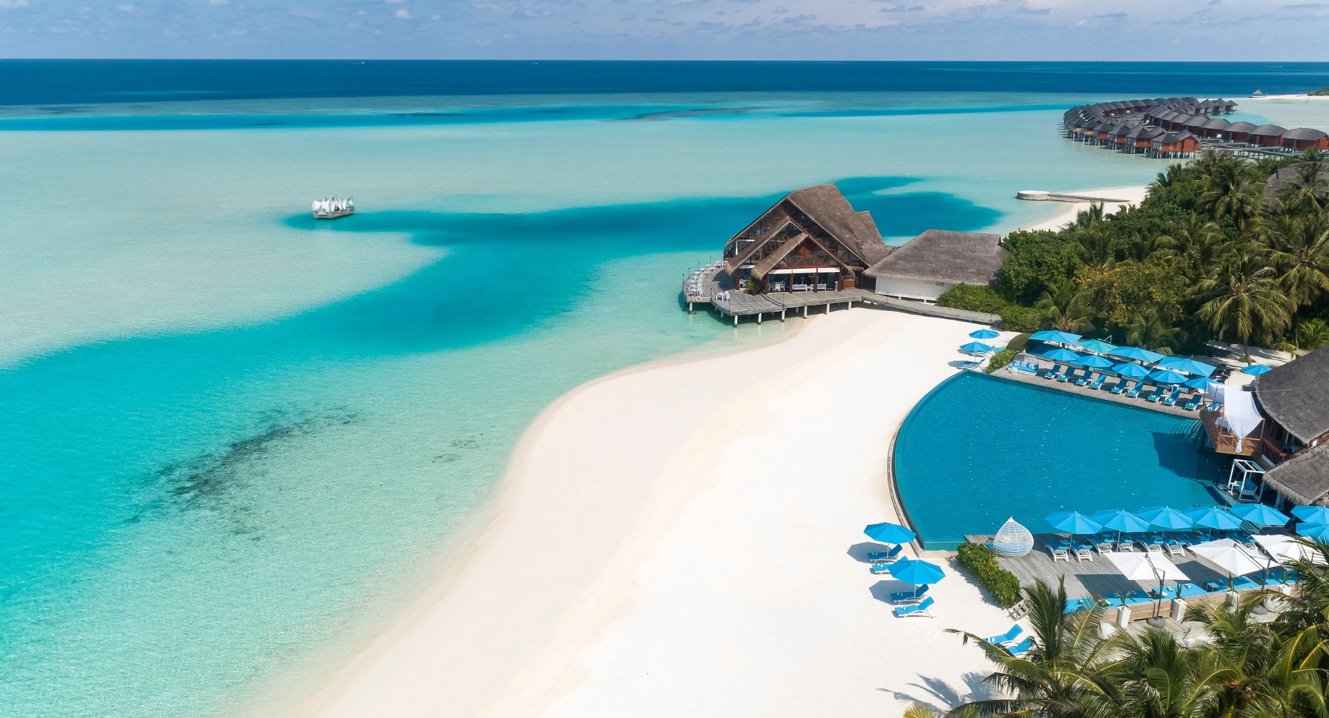 Aerial view of the swimming pool at Anantara Dhigu Maldives Resort