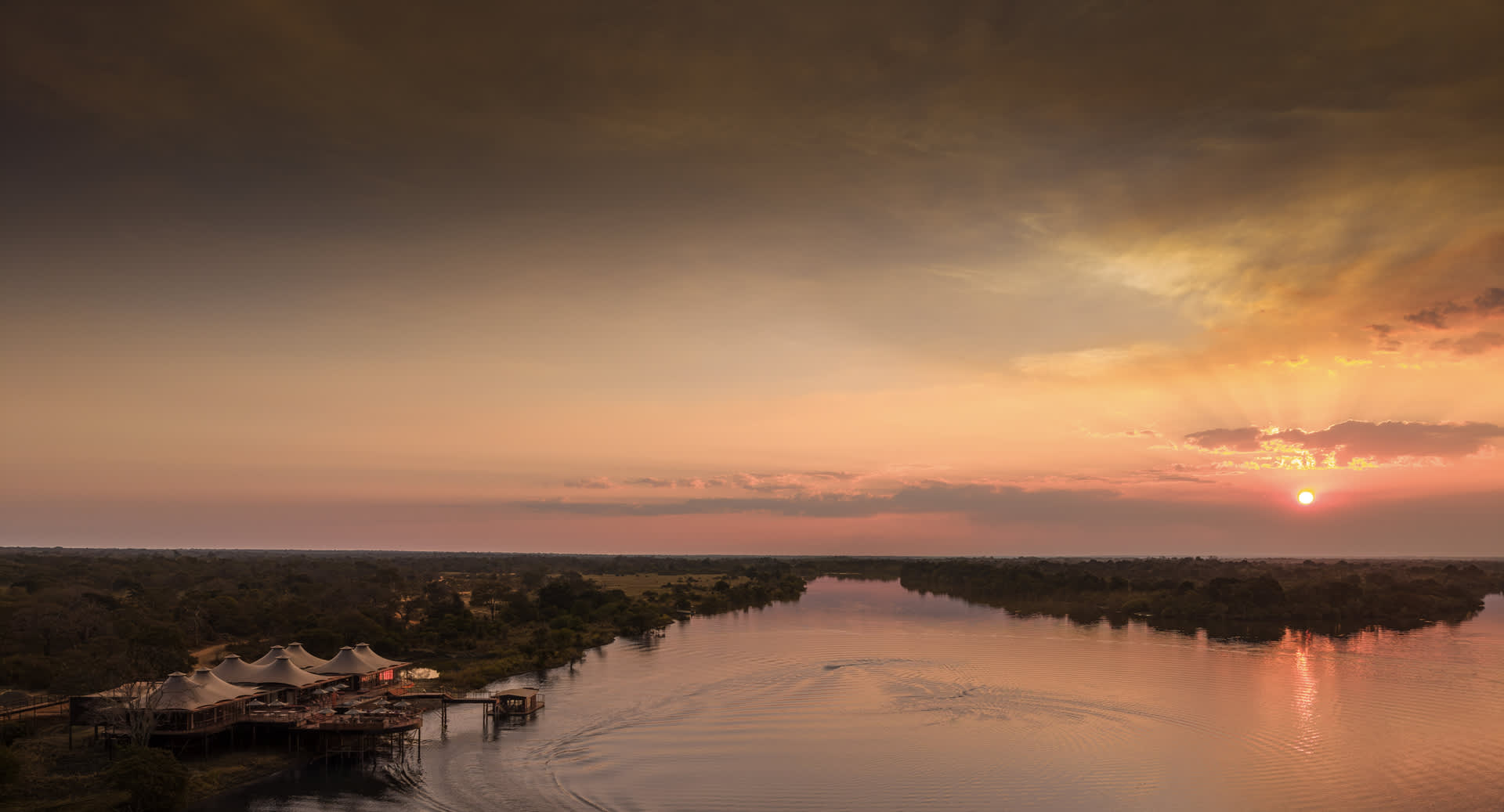 Anantara_Tented_Camp_Kafue_River_Exterior_Sunset_Boat
