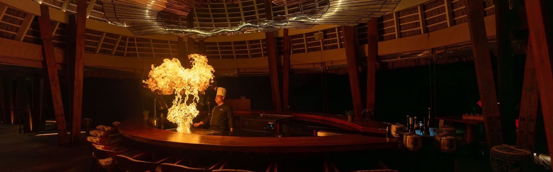 Flames and flair on the flat-top grill at Anantara Kihavah Maldives