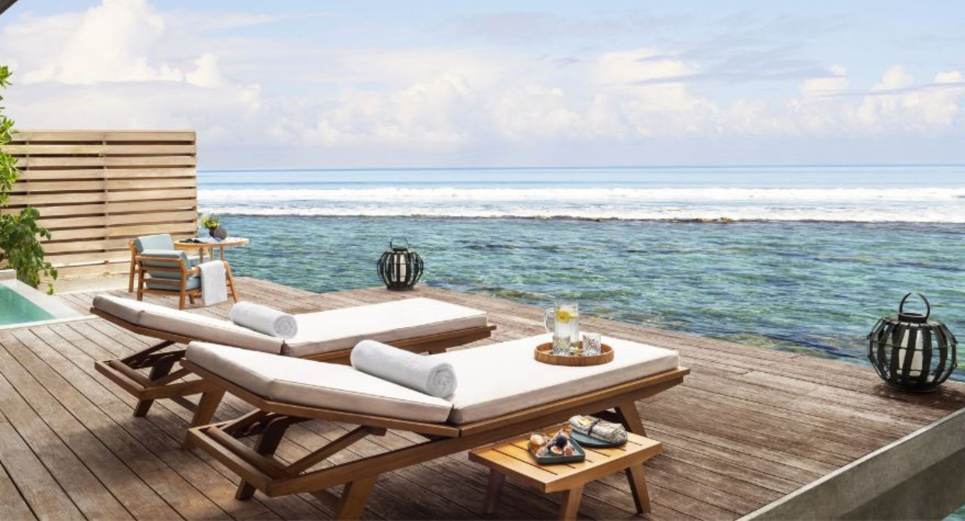 Ocean pool Villa guest bedroom pool deck at Anantara Veli Maldives Resort