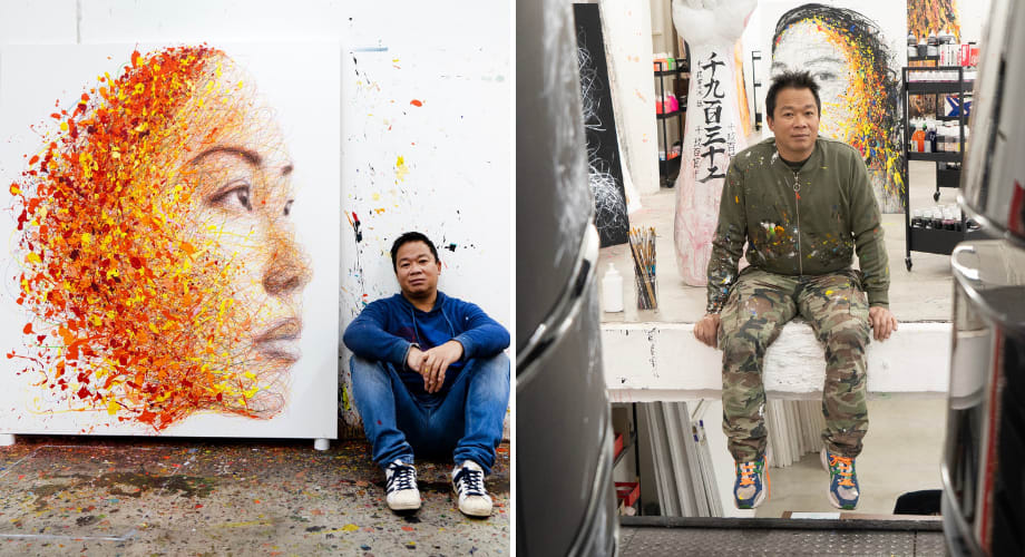 Hom Nguyen sitting in his studio, surrounded by his figurative portraits.