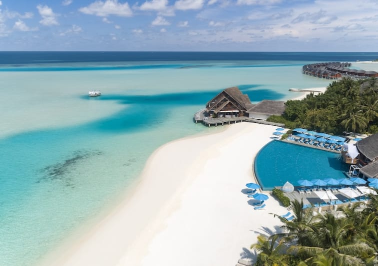 Island aerial view of Anantara Dhigu Maldives Resort