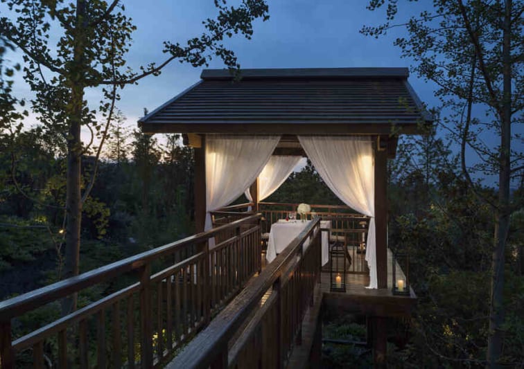Exterior view of private Dining-by_Design set-up at twilight