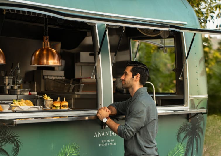 guest orders food at the food truck