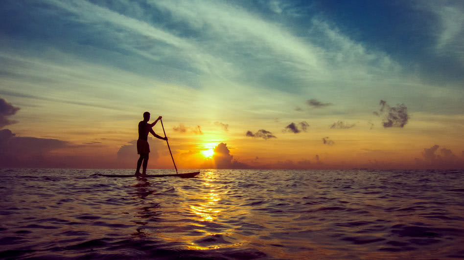 Paddle Boarding During the Sunset in Oman with Anantara Salalah Resort
