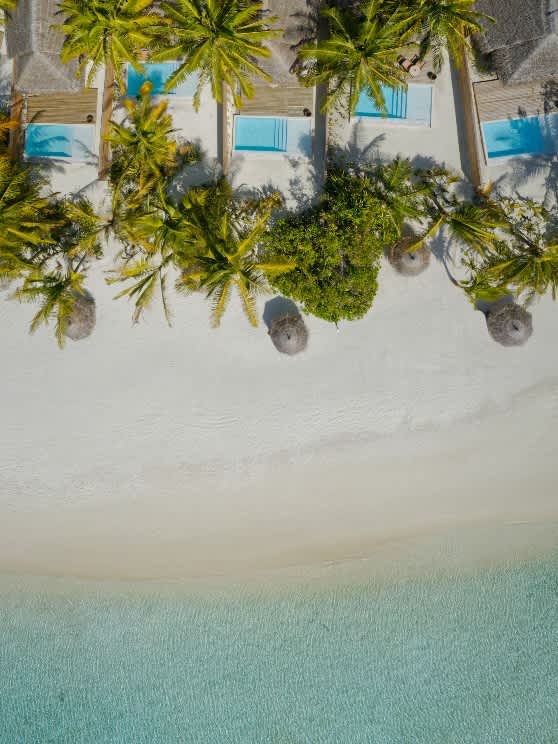Aerial view of the Sunset Beach Pool Villa at Anantara Dhigu Maldives Resort