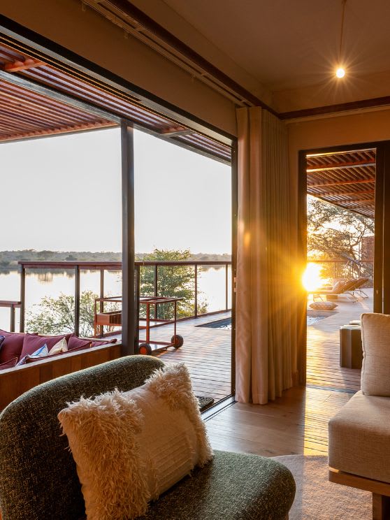 Living room with River view at Anantara Tented Camp Kafue River