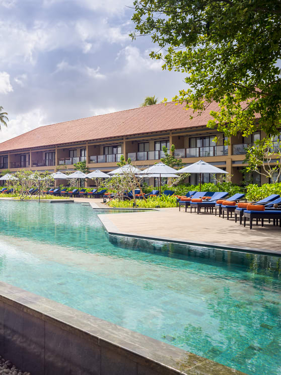 Pool with the resort in the background by day