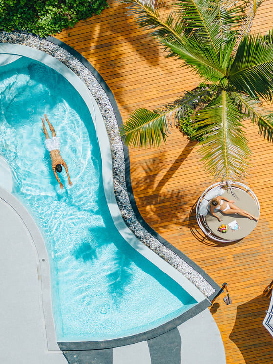 guests in beachfront pool villa